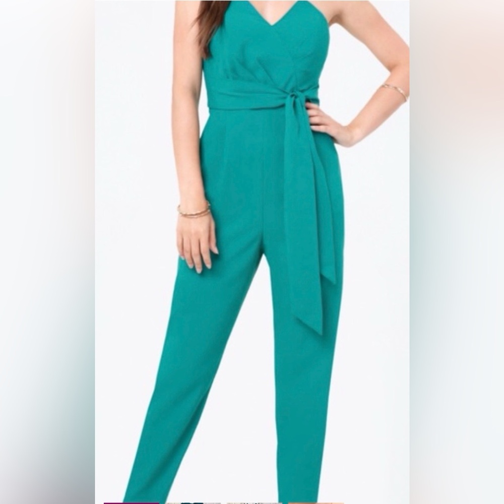 EUC bebe Teal size 00  Strapless Crossover Jumpsuit
